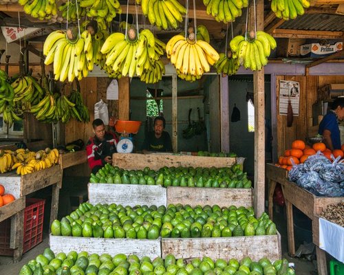 Traditional Indonesian marketplace where fresh agricultural produce and tropical fruits are sold directly